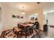 The dining area offers a pass-through to the kitchen, seamlessly blending dining and kitchen spaces at 4023 Stillwater Dr, Duluth, GA 30096