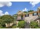 Inviting apartment building exterior with manicured landscaping and covered entries at 4023 Stillwater Dr, Duluth, GA 30096