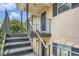 Staircase leading to a cozy apartment featuring black railings and exterior paint at 4023 Stillwater Dr, Duluth, GA 30096
