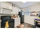 Bright kitchen featuring white cabinets, black appliances, and functional layout at 4023 Stillwater Dr, Duluth, GA 30096