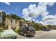 View of the parking lot of apartments featuring a glimpse of building exterior at 4023 Stillwater Dr, Duluth, GA 30096