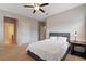 Spacious bedroom with cozy carpet, natural light, and a calming color palette for ultimate relaxation at 4814 Little Cove Ct, Auburn, GA 30011