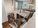 View from the stairwell of a second-story game room with pool table and bar seating at 4814 Little Cove Ct, Auburn, GA 30011