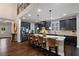 Spacious kitchen with granite counters, stainless steel appliances, and dark wood floors at 4814 Little Cove Ct, Auburn, GA 30011