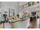 Open-concept floorplan with living room, staircase, and kitchen at 4814 Little Cove Ct, Auburn, GA 30011