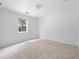 A bright bedroom featuring tile floors and a window offering natural light at 1093 Athena Ct, Acworth, GA 30101