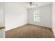 Comfortable bedroom with neutral carpet and a ceiling fan at 1093 Athena Ct, Acworth, GA 30101