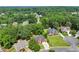 Aerial view of homes in a lush community at 5054 Kingsbridge Pass, Powder Springs, GA 30127