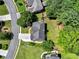 Expansive property featuring lush green landscaping and concrete driveway at 5054 Kingsbridge Pass, Powder Springs, GA 30127