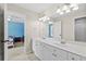 Bathroom with double vanity and a view into the bedroom and shower at 5054 Kingsbridge Pass, Powder Springs, GA 30127