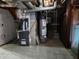 Unfinished basement with tile floor, mechanicals, and open space ready for customization at 7437 Grayson Dr, Riverdale, GA 30296
