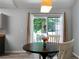 Charming dining room with hardwood floors, a round table, and sliding glass doors, perfect for entertaining at 86 Kelly Ct, Dallas, GA 30157