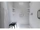 Clean white shower with grab bar and shower seat at 86 Kelly Ct, Dallas, GA 30157