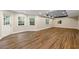 Spacious basement with vinyl floors, recessed lighting, and a walkout door at 1413 Eastbrooke Way, Marietta, GA 30066