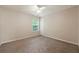 Neutral bedroom with standard window and ceiling fan at 1413 Eastbrooke Way, Marietta, GA 30066