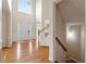 Bright foyer features a soaring ceiling, hardwood floors, and elegant staircase at 1413 Eastbrooke Way, Marietta, GA 30066