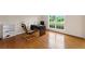 Bright home office featuring hardwood floors, a large window, and ample natural light at 1413 Eastbrooke Way, Marietta, GA 30066