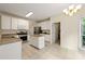 Bright kitchen with stainless steel appliances, granite countertops, and a center island, ideal for cooking and entertaining at 1413 Eastbrooke Way, Marietta, GA 30066