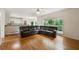 Spacious living room with hardwood floors, a large window, and an open layout at 1413 Eastbrooke Way, Marietta, GA 30066