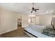 Bright main bedroom featuring tray ceilings and an en-suite bathroom at 1413 Eastbrooke Way, Marietta, GA 30066
