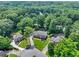 Aerial view of the property and its surrounding lush landscape at 4211 Schooner Ne Ct, Roswell, GA 30075