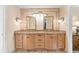 Bathroom featuring double sinks with granite counters and tiled walls for a luxurious feel at 4211 Schooner Ne Ct, Roswell, GA 30075