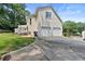 Home featuring a two-car garage and driveway at 4211 Schooner Ne Ct, Roswell, GA 30075
