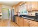 Kitchen featuring stainless steel appliances, granite countertops, and hardwood floors at 4211 Schooner Ne Ct, Roswell, GA 30075
