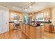 Well-equipped kitchen featuring a central island, stainless steel appliances, and ample cabinet space at 4211 Schooner Ne Ct, Roswell, GA 30075