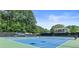 Community tennis courts, perfect for staying active and enjoying the outdoors at 4211 Schooner Ne Ct, Roswell, GA 30075