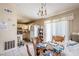 Bright dining area adjacent to kitchen, offering plenty of space and natural light through sliding glass doors at 504 Azalea Ct, Woodstock, GA 30188