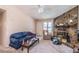 Inviting living room with natural light, a stone fireplace, and comfortable seating, perfect for Gathering gatherings at 504 Azalea Ct, Woodstock, GA 30188