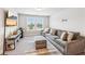A cozy bonus room with comfortable seating, soft lighting and an entertainment center at 515 Cobblestone Ct, Canton, GA 30115