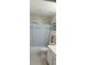 Clean bathroom with a tub and shower combination and white cabinetry at 2905 Olde Town Park Dr, Norcross, GA 30071