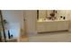 Large bathroom with dual sinks, a soaking tub, neutral tile, and a separate glass shower at 2905 Olde Town Park Dr, Norcross, GA 30071
