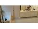 Large bathroom with dual sinks, a soaking tub, neutral tile, and a separate glass shower at 2905 Olde Town Park Dr, Norcross, GA 30071