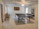 Spacious game room featuring a ping pong table and ample seating at 2905 Olde Town Park Dr, Norcross, GA 30071