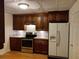 Charming kitchen with stainless steel appliances and ample cabinet space at 2905 Olde Town Park Dr, Norcross, GA 30071