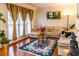 Comfortable living room with hardwood floors, large windows, and stylish furnishings at 2905 Olde Town Park Dr, Norcross, GA 30071