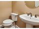 Powder room with white fixtures, oval mirror, and neutral-toned walls at 2969 Rivergreen Se Ln # 23, Atlanta, GA 30339