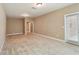 Spacious carpeted bedroom features neutral walls and a glass patio door at 2969 Rivergreen Se Ln # 23, Atlanta, GA 30339