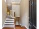 Home foyer featuring wooden floors, stairs, and neutral wall paint at 2969 Rivergreen Se Ln # 23, Atlanta, GA 30339