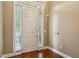 Home's foyer featuring a white front door and light hardwood floors at 2969 Rivergreen Se Ln # 23, Atlanta, GA 30339