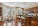 Eat-in kitchen featuring wooden cabinets, stainless steel appliances, and hardwood flooring at 2969 Rivergreen Se Ln # 23, Atlanta, GA 30339