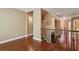 Cozy living area with fireplace and stairs access to a large room with a view at 2969 Rivergreen Se Ln # 23, Atlanta, GA 30339