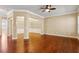 Spacious open living room with hardwood floors that flow into the dining area at 2969 Rivergreen Se Ln # 23, Atlanta, GA 30339