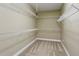 Spacious walk-in closet features extensive wire shelving for optimal storage and organization at 2969 Rivergreen Se Ln # 23, Atlanta, GA 30339
