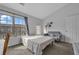 Bedroom featuring a bed, a sofa and two large windows offering plenty of natural light at 3014 Liberty Nw Way, Atlanta, GA 30318