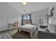 Bright and airy bedroom with a view, a cozy sofa, and ample natural light at 3014 Liberty Nw Way, Atlanta, GA 30318