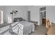 Bright bedroom featuring a seating area, neutral walls, and an ensuite bathroom for added convenience at 3014 Liberty Nw Way, Atlanta, GA 30318